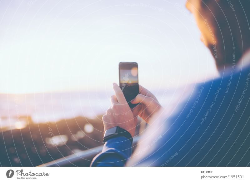 Man taking photo of the sunset with his smart phone Lifestyle Ocean Waves Telephone Cellphone PDA Camera Technology High-tech Human being Young man