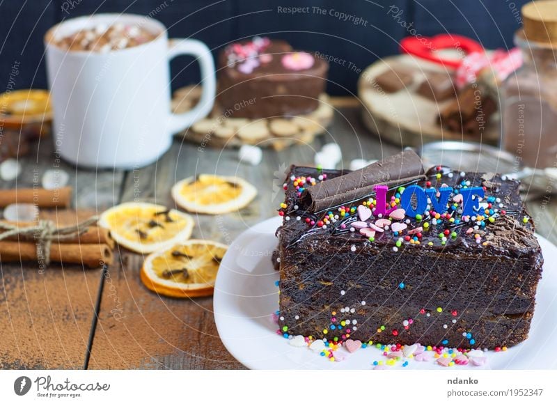 piece of chocolate cake on a white plate Food Beverage Hot Chocolate Coffee Plate Mug Cutlery Restaurant Wood Love Delicious Brown Gray White Sacher Vienna