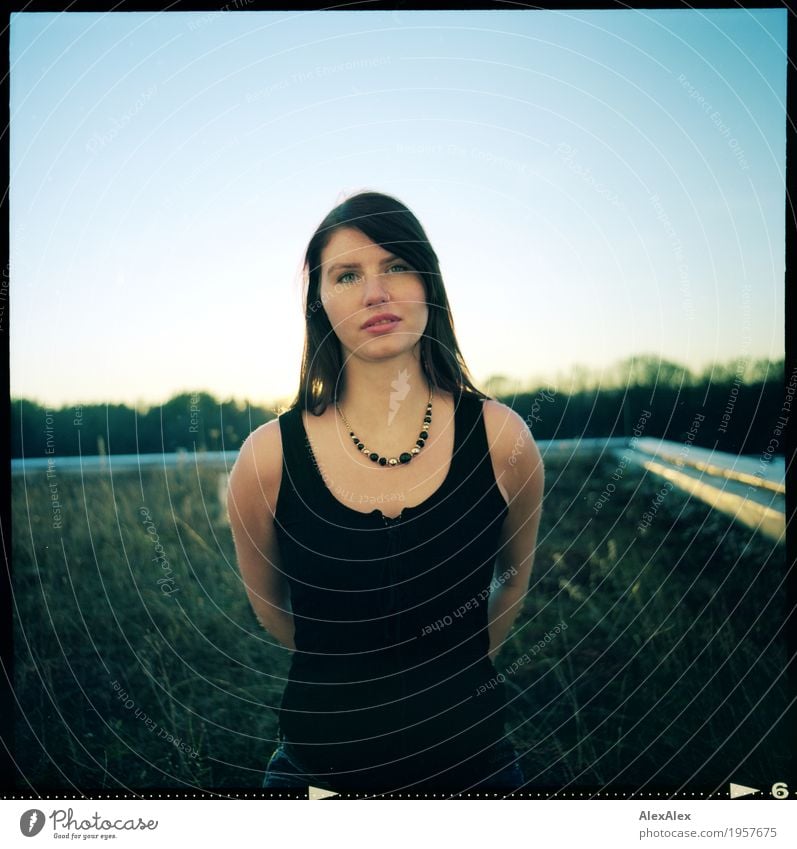 on top of Harmonious Young woman Youth (Young adults) Face Freckles 18 - 30 years Adults Landscape Cloudless sky Horizon Beautiful weather Grass Roof Top