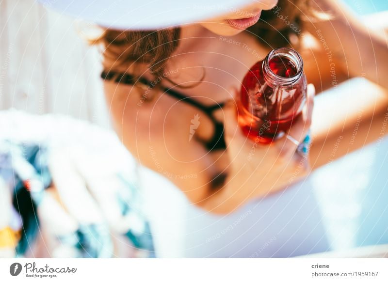 Pretty young women enjoying cool drink at swimming pool Drinking Cold drink Lemonade Bottle Lifestyle Joy Wellness Well-being Relaxation Swimming pool Whirlpool