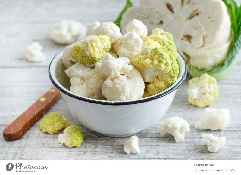 Fresh raw cauliflower in a bowl Vegetable Nutrition Vegetarian diet Diet Bowl Wood Retro Green Cauliflower cabbage Cooking food health healthy Ingredients