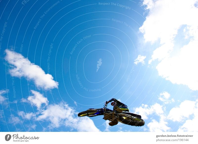 close to heaven Lifestyle Motocross racing Sports Motorsports Sporting event Motorcycle Flying Jump Blue Brave Risk Colour photo Exterior shot Copy Space top