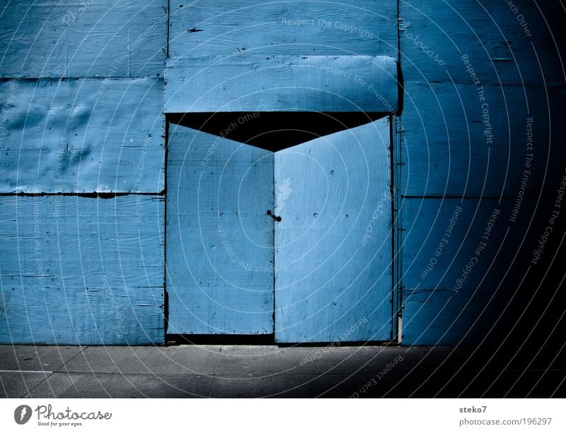 into the blue Door Build Curiosity Blue Bans Construction site Wooden wall Closed Portal Mysterious Hiding place Colour photo Exterior shot Deserted