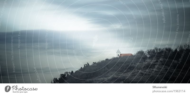 Catholic church on hill. Design Decoration Wallpaper Clouds Hill Peak Church Building Architecture Landmark Bright Rich Blue Colour Religion and faith backdrop