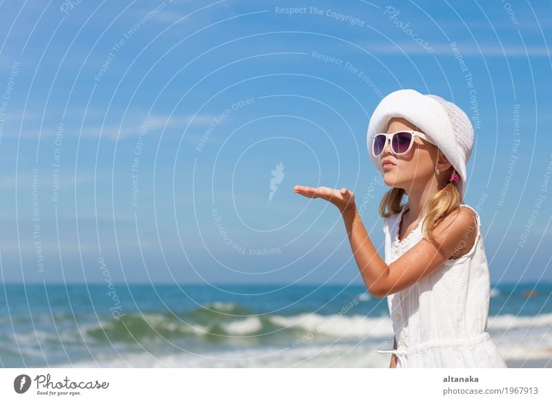 Little girl standing on the beach Lifestyle Joy Happy Beautiful Relaxation Leisure and hobbies Playing Vacation & Travel Freedom Summer Sun Beach Ocean Child