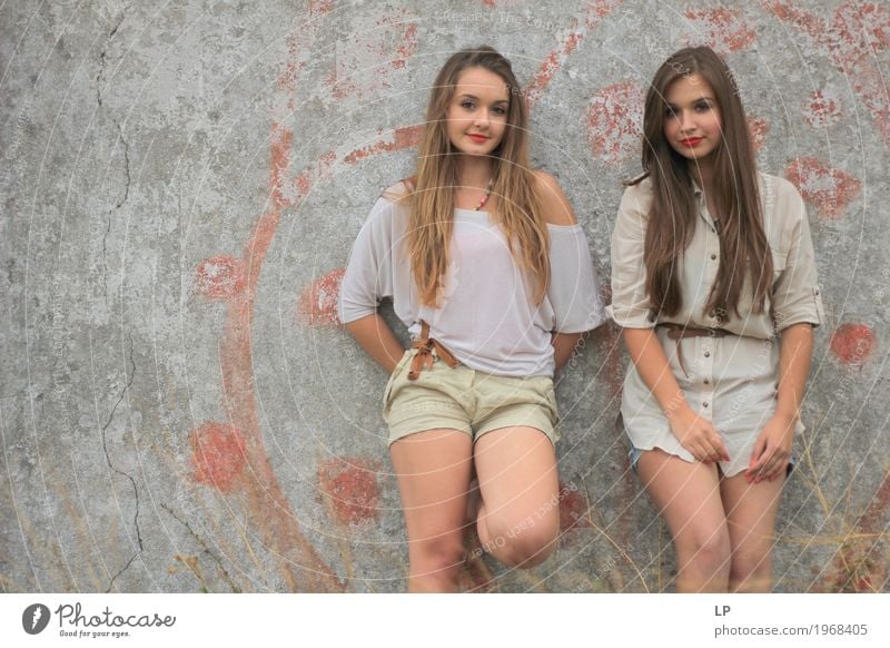 2 girls standing against a wall, posing for the camera Lifestyle Style Beautiful Body Hair and hairstyles Wellness Harmonious Well-being Contentment Senses