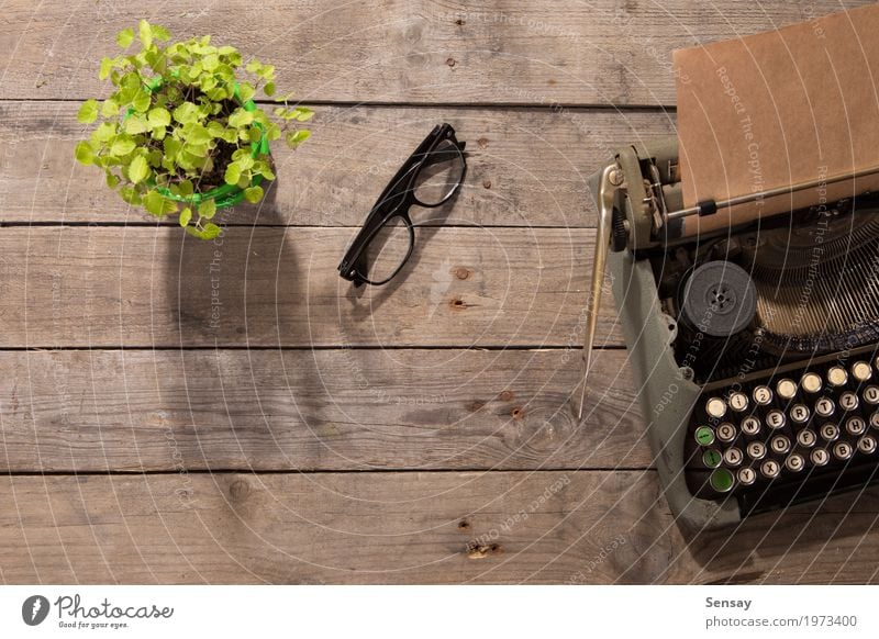 Vintage typewriter on the old wooden desk Desk Table Office Newspaper Magazine Book Plant Paper Wood Old Write Retro Green Typewriter background vintage Clerk