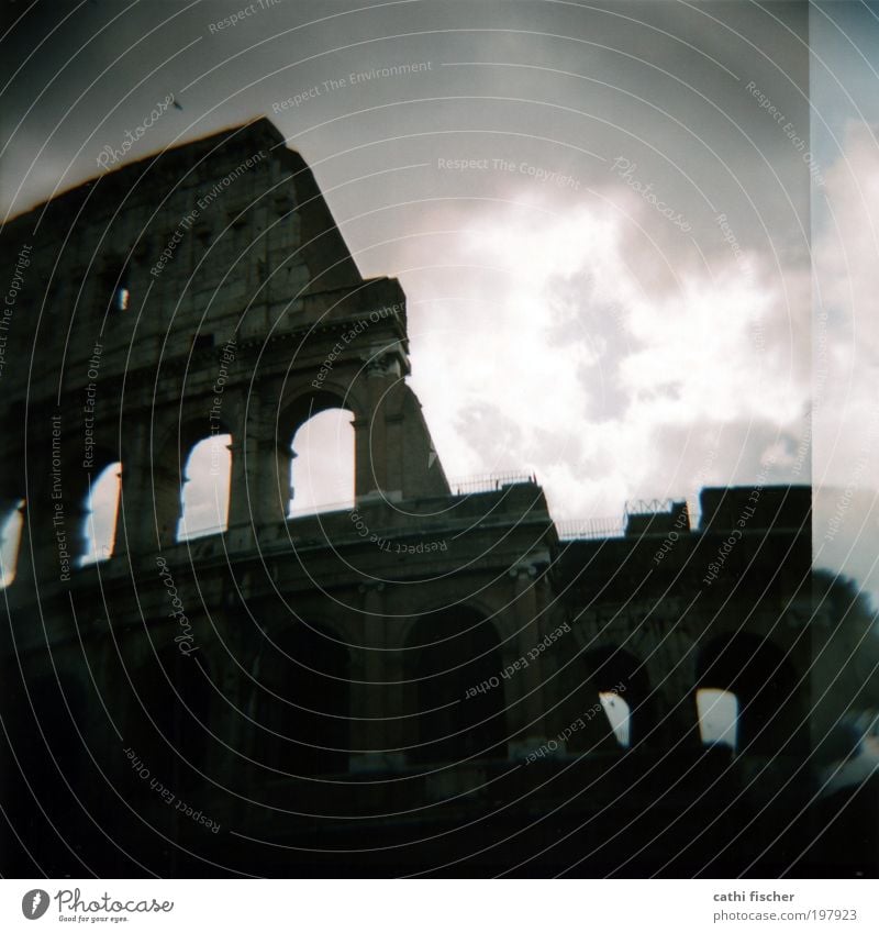 colosseo Sky Clouds Storm clouds Weather Bad weather Rome Italy Europe Capital city Ruin Manmade structures Architecture Tourist Attraction Colosseum Gray Black