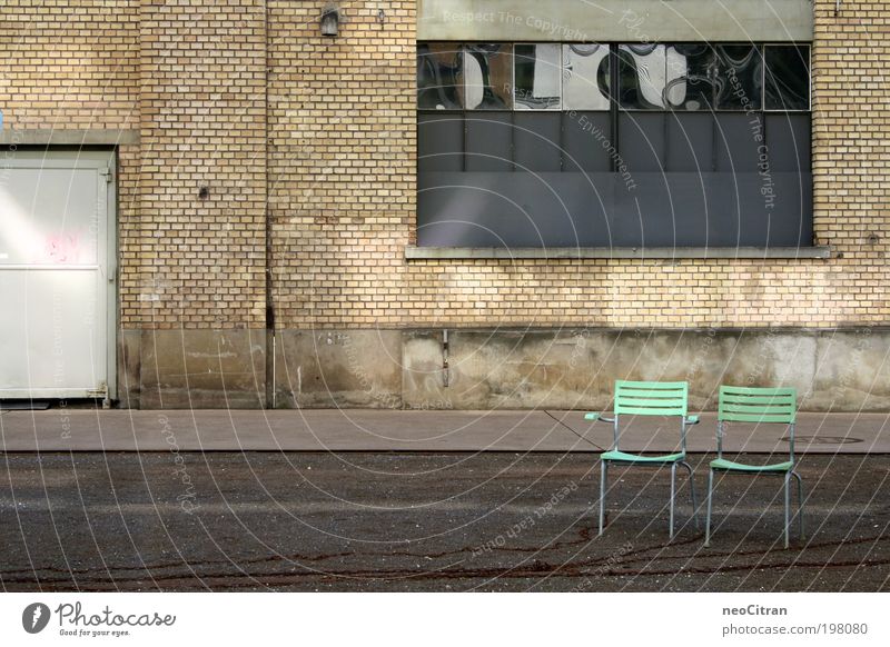 Even more chairs Chair Winterthur Places Parking garage Window Door Asphalt Chain Metal Plastic Stand Gray Green Symmetry Esthetic Arrangement Colour photo