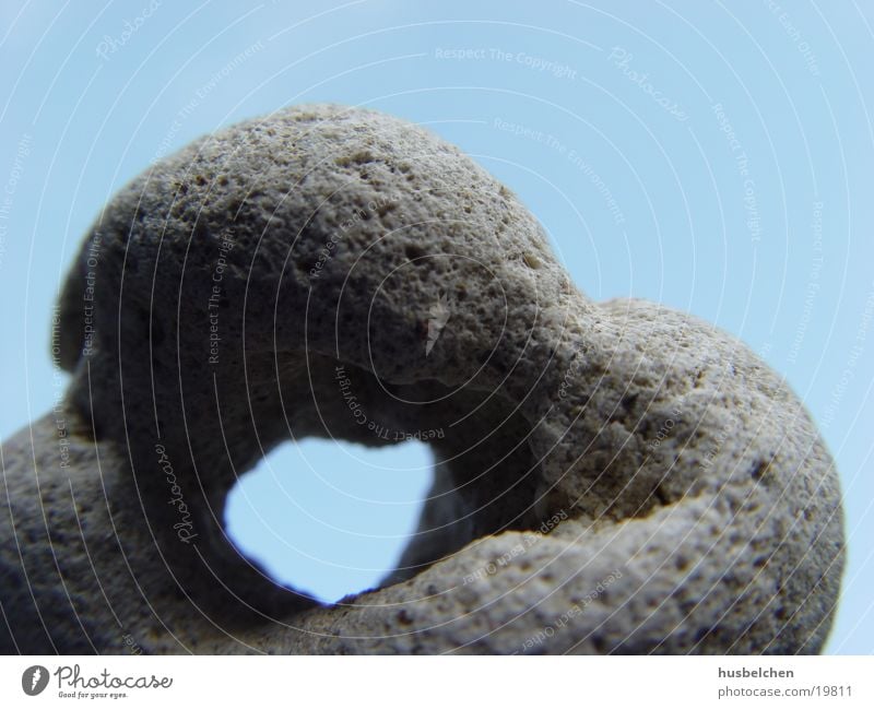 hole to see the sky through Erosion Stone perforated brick Sky