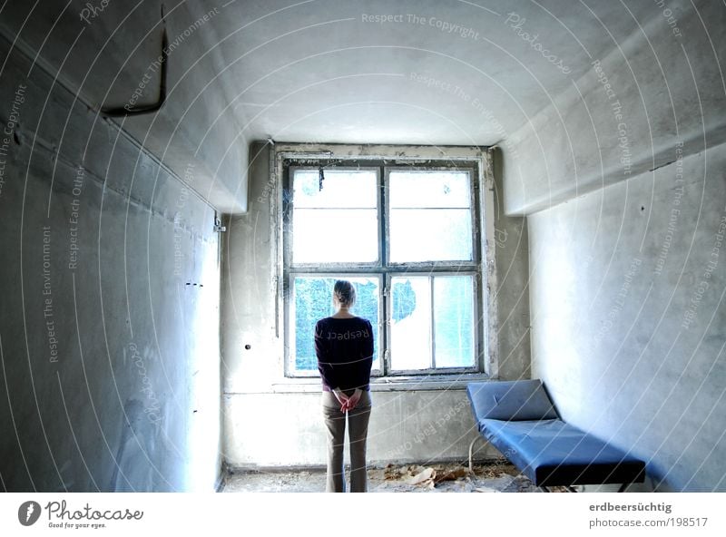 You can check out any time you like... - Woman looking through a broken window of a run-down room with a treatment couch Light Shadow Vacation & Travel