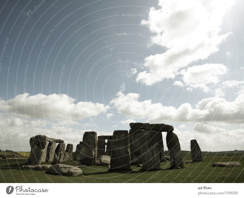 Stone Age Museum Work of art Outdoor festival Nature Landscape Sky Clouds Sun Beautiful weather Grass Park Meadow Field Hill Ruin Gate Architecture Facade