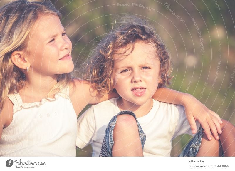 Sister and brother playing on the beach at the day time. Concept Brother And Sister Together Forever Lifestyle Joy Happy Beautiful Relaxation