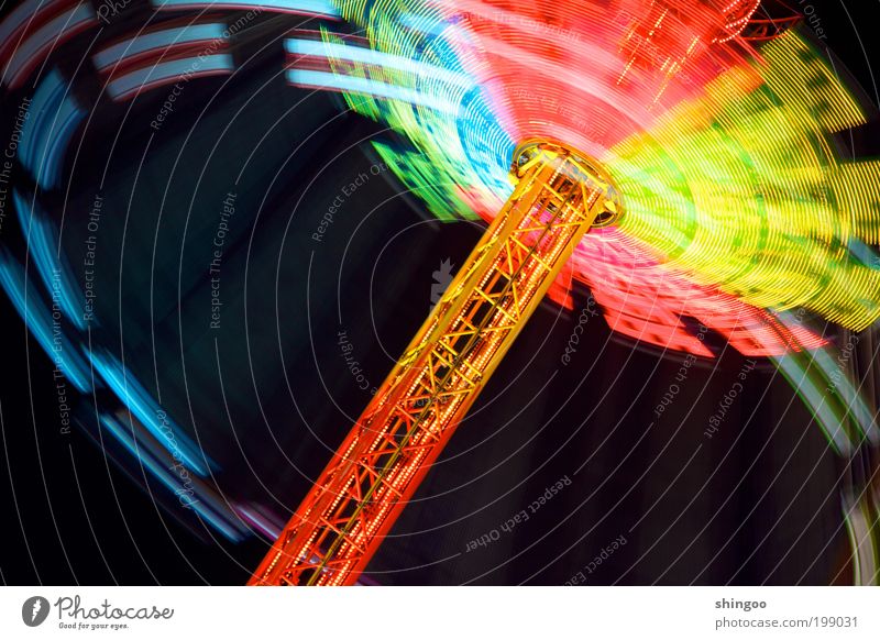 dizzy spell Leisure and hobbies Entertainment Event Movement Illuminate Bright Above Speed Blue Multicoloured Yellow Green Red Vertigo Colour Theme-park rides