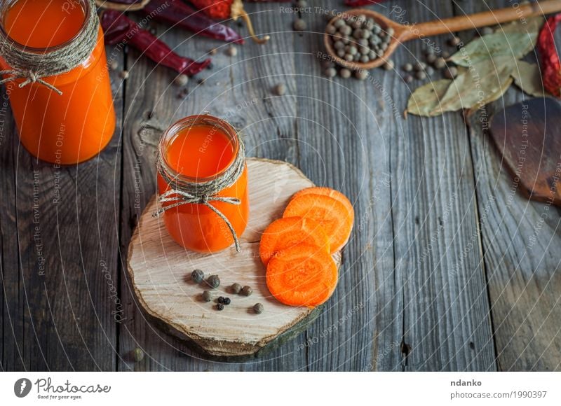 Glass jars with juice on a gray wooden background Food Vegetable Herbs and spices Vegetarian diet Diet Beverage Cold drink Juice Table Nature Wood Old Drinking