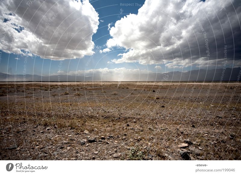 Nothing Nature Landscape Sand Sky Clouds Desert Dry Blue Brown Loneliness Far-off places Death valley Nationalpark USA Nevada Steppe Colour photo Exterior shot