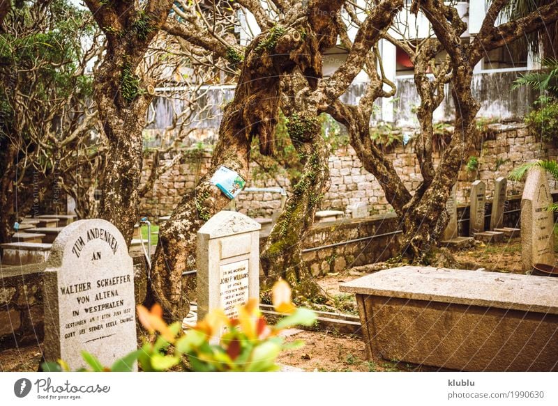 An old quiet graveyard in Macao, China Calm Monument Stone Sadness Death Peace Cemetery Silent Grave Tomb sad silence tombstone Funeral memory asian Spiritual