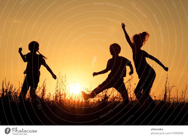 Happy children playing in the park Lifestyle Joy Leisure and hobbies Playing Vacation & Travel Trip Freedom Summer Sun Sports Child School Girl Boy (child)