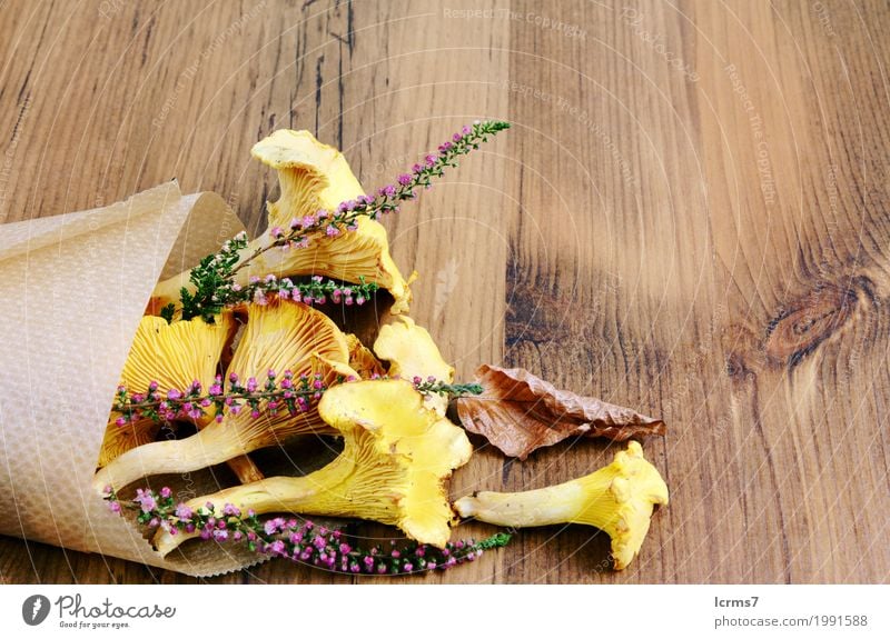 paper bag with golden chanterelle and erica flower Healthy Eating Yellow chantarelle food Mountain heather healthy natural fresh mushrooms organic tasty