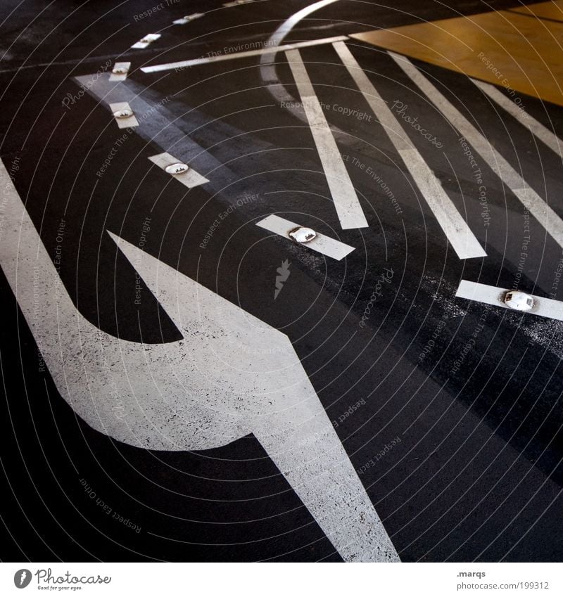 U-Turn Design Trip Town Transport Traffic infrastructure Crossroads Road sign Parking garage Sign Line Arrow Stripe Dark Mobility Curve Dynamics Colour photo