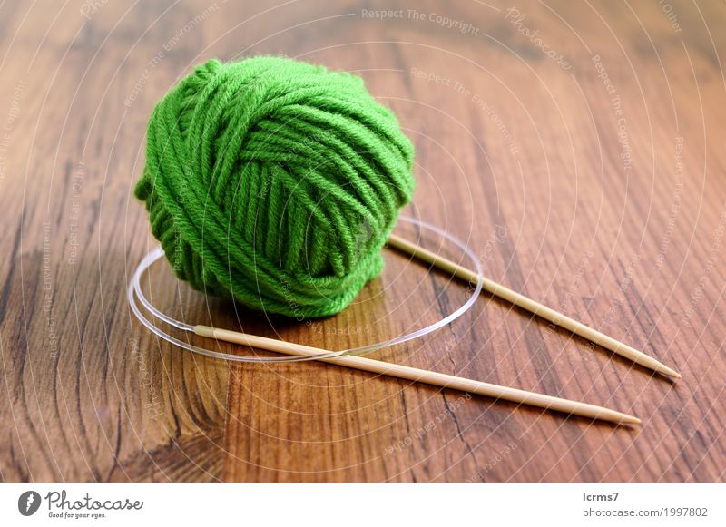 knit needles and wool on table. knitting. Leisure and hobbies Warmth Fashion Wool Knit Creativity creased yarn handmade The Needles Background picture woolen