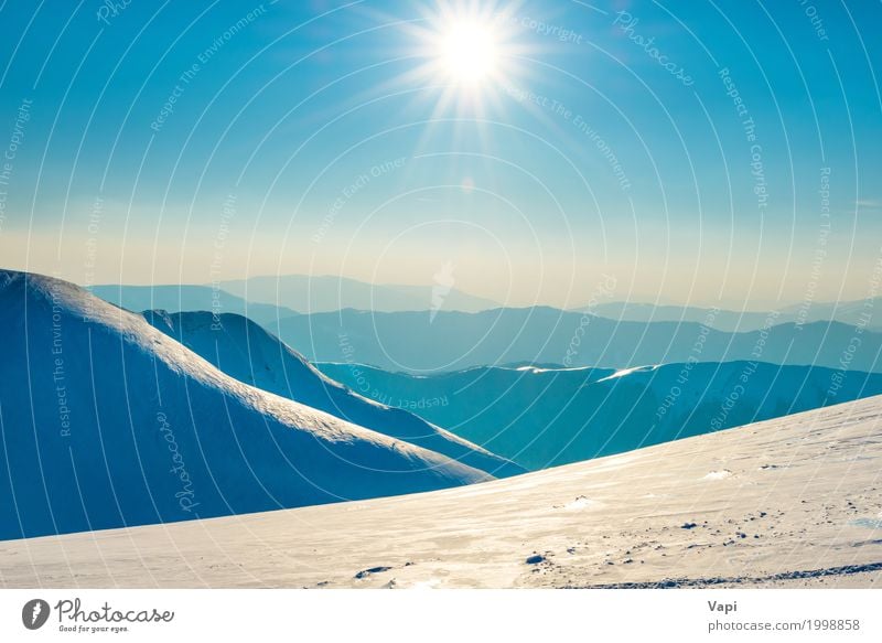 Bright sun in winter mountains Vacation & Travel Sun Winter Snow Mountain Environment Nature Landscape Sky Cloudless sky Horizon Sunrise Sunset Sunlight