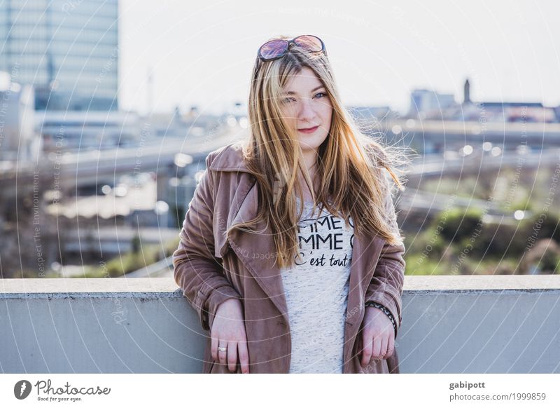 young woman against urban background Lifestyle pretty Personal hygiene Hair and hairstyles Human being Feminine Young woman Youth (Young adults) Woman Adults 1