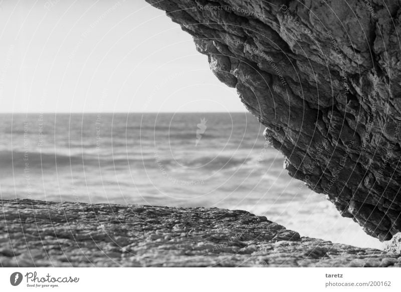 stone Environment Nature Elements Water Cloudless sky Waves Coast Horizon Steep Corner Graphic Triangle Vantage point Atlantic Ocean Portugal Air Rock Cliff