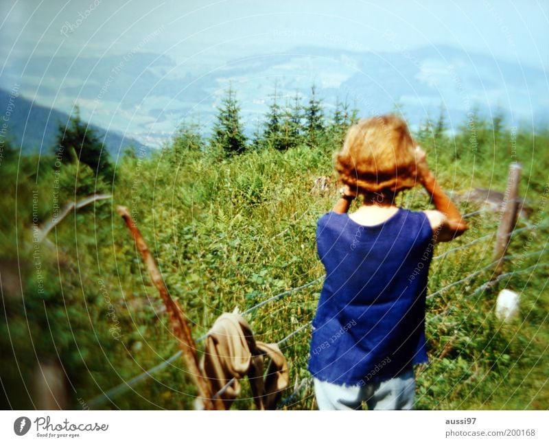 Teresa Di Vicenzo Sightseeing Inspection Observe Discover Woman Lady Binoculars Vantage point Footpath Hiking Fence Barbed wire Blur positive liquid Landscape