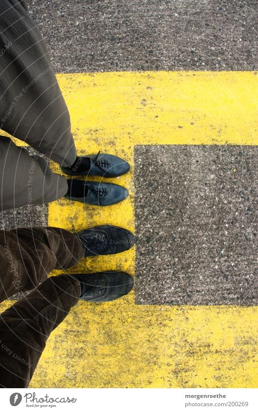 waiting for a new life Human being Legs Feet 2 18 - 30 years Youth (Young adults) Adults Stand Wait Brown Yellow Gray Together Assembly Asphalt Footwear 4