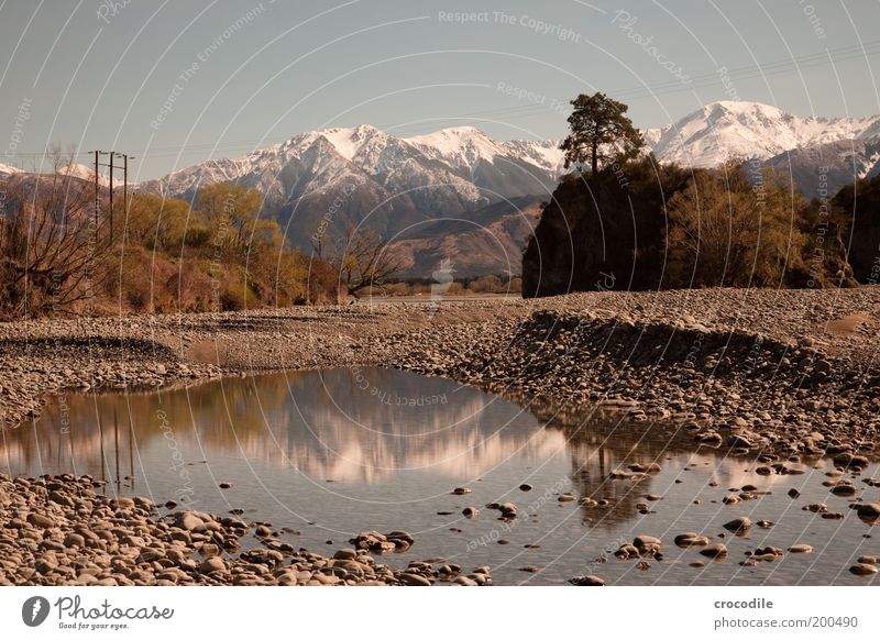 New Zealand 58 Environment Nature Landscape Water Sky Spring Beautiful weather Snow Rock Alps Mountain Peak Snowcapped peak Glacier Moody Symmetry Colour photo