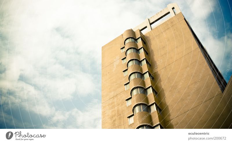 Housing estate in Schilda Sky Clouds China Xian Asia High-rise Architecture Facade Window Sharp-edged Simple Large Bright Above Retro Town Blue Brown