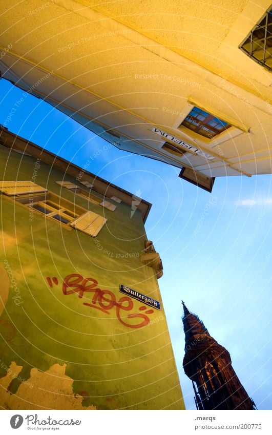 Buttergasse Old town Church Facade Tourist Attraction Graffiti Tall Town Blue Yellow Green Perspective Freiburg im Breisgau Old building Twilight