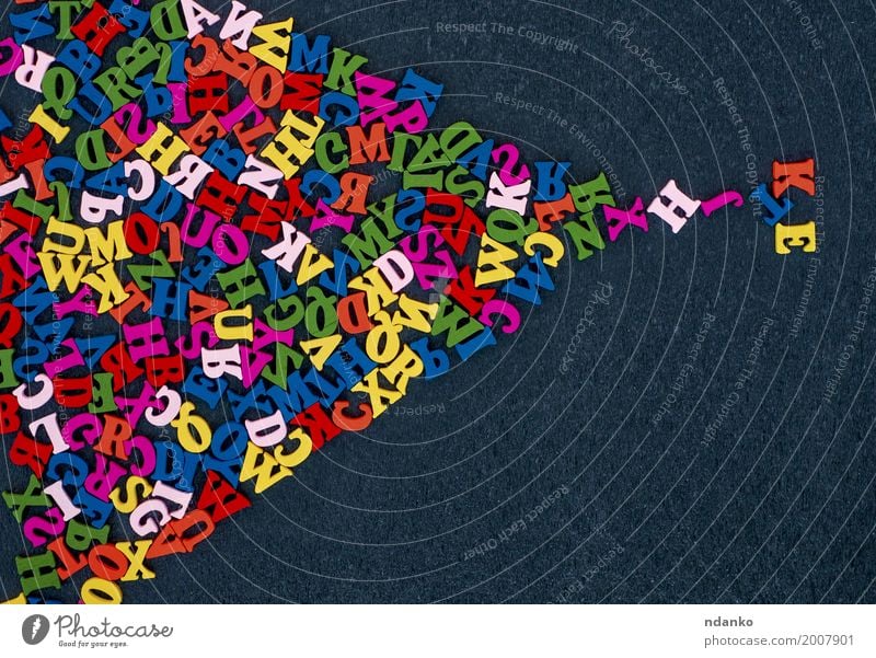 Abstract black background with multicolored wooden letters Education Wood Study Above Multicoloured Black Colour many alphabet Symbols and metaphors Word abc