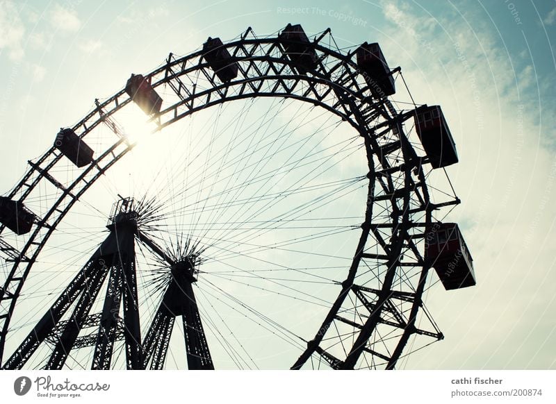 Ferris wheel Tourism Sightseeing City trip Summer Vienna Austria Tourist Attraction Landmark Blue Prater Wheel Sky Clouds Amusement Park Colour photo