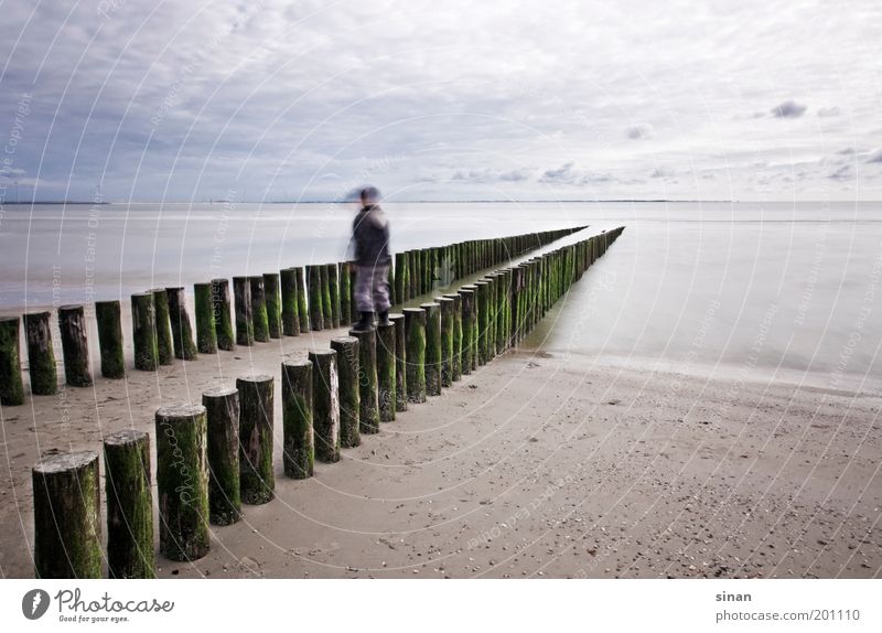 breakwater Calm Leisure and hobbies Far-off places Ocean Child Nature Water Sky Clouds Horizon Weather Esthetic Cool (slang) Happiness Infinity Cold Wet Blue