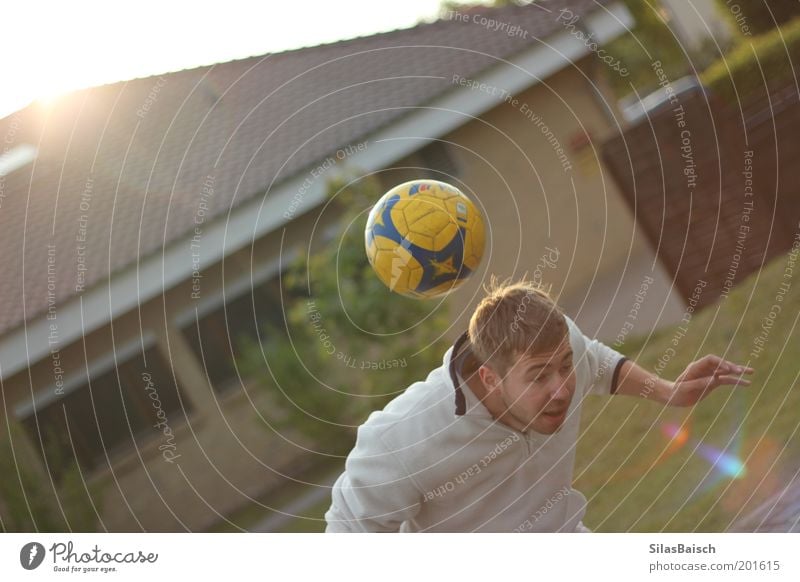 Football Time Sports Soccer Movement Playing Header Colour photo Exterior shot Evening Reflection Sunlight Sunbeam Back-light Shallow depth of field