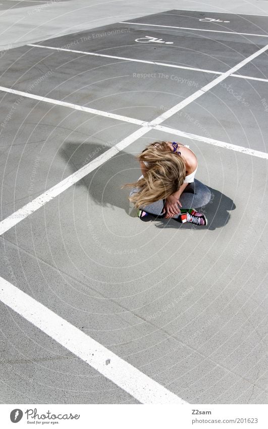 left alone Style Young woman Youth (Young adults) 18 - 30 years Adults Parking garage Hair and hairstyles Long-haired Concrete Sit Sadness Esthetic Blonde Dark