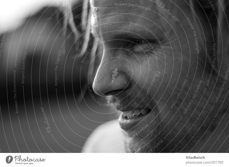 substitute Human being Masculine Long-haired Facial hair Black & white photo Exterior shot Evening Back-light Deep depth of field Half-profile Looking away Face