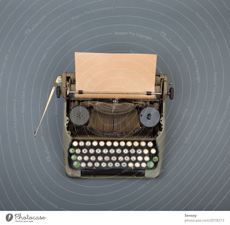 Top view of vintage typewriter on grey table Coffee Desk Table Workplace Office Newspaper Magazine Book Paper Old Observe Write Retro Green White Typewriter