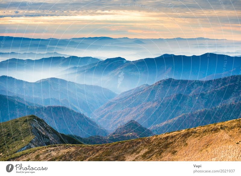 Blue mountains and hills at sunset Beautiful Vacation & Travel Tourism Adventure Far-off places Freedom Sun Mountain Nature Landscape Sky Clouds Horizon Sunrise