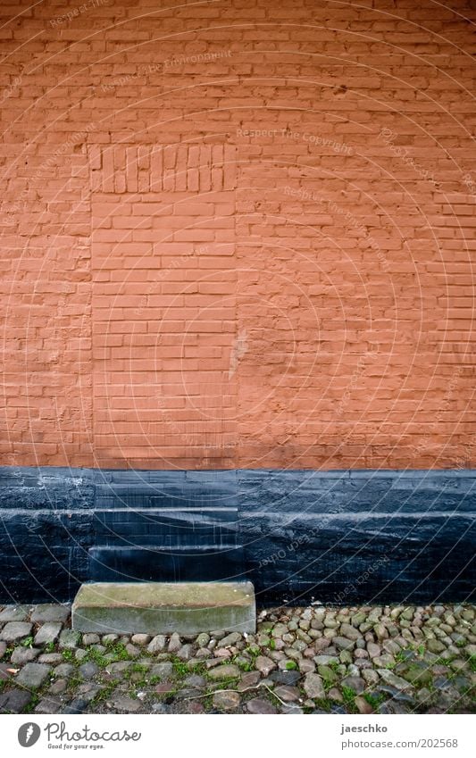 Closed for longer periods Wall (barrier) Wall (building) Facade Door Stone Brick Old Red Mysterious Puzzle Surrealism Captured Entrance Mystic Mystery Eerie