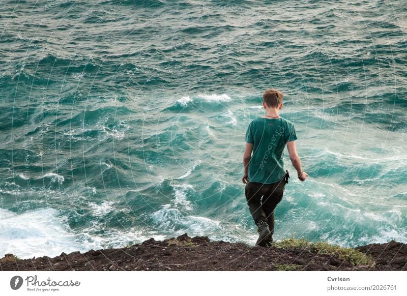 One with the sea Ocean Waves Masculine Young man Youth (Young adults) 1 Human being 18 - 30 years Adults Water Rock Lakeside T-shirt Blonde Short-haired Going