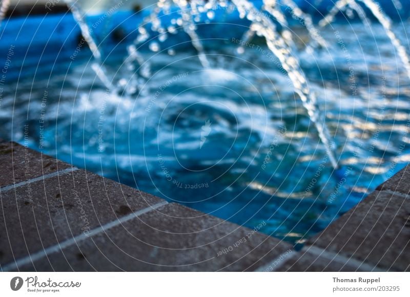 waterfall I Water Drops of water Well Stone Concrete Brick Blue Brown Colour photo Subdued colour Exterior shot Deserted Evening Light Reflection Sunbeam