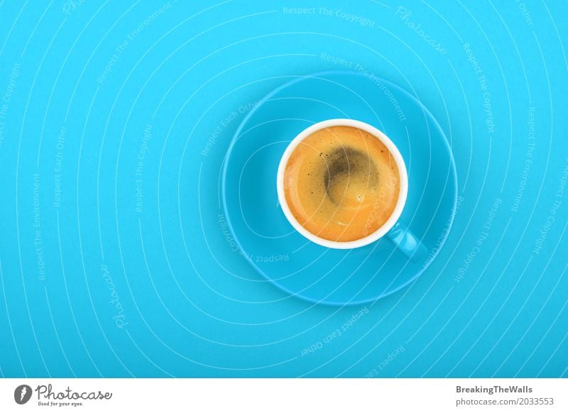 Espresso in blue cup on blue background Breakfast To have a coffee Beverage Hot drink Coffee Mug Art Paper Blue Cool (slang) Determination Serene Elegant Energy