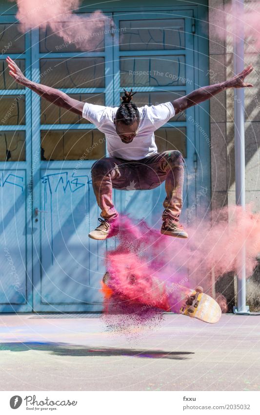 Skating with Holi Powder Lifestyle Joy Athletic Fitness Leisure and hobbies Sports Sportsperson Skateboard Skateboarding Human being Masculine Young man