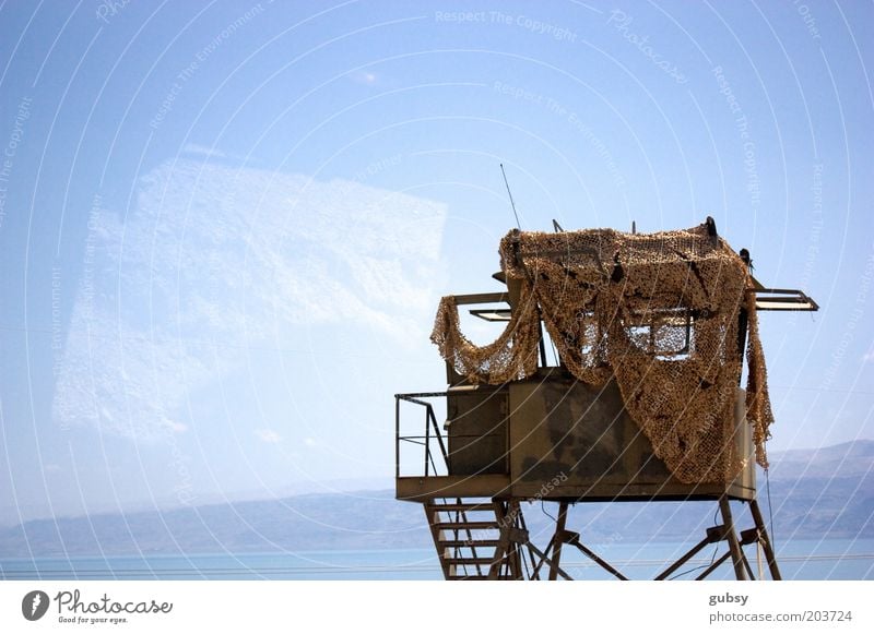 army vigilance base Ocean Mountain The Dead Sea Deserted Bus travel Army Death War Israel Subdued colour Exterior shot Copy Space left Neutral Background Day