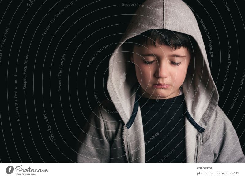 Sad boy on black background Child Head 1 Human being 3 - 8 years Infancy Sweater Black-haired Sadness Concern Grief Pain Loneliness Guilty Remorse Fear