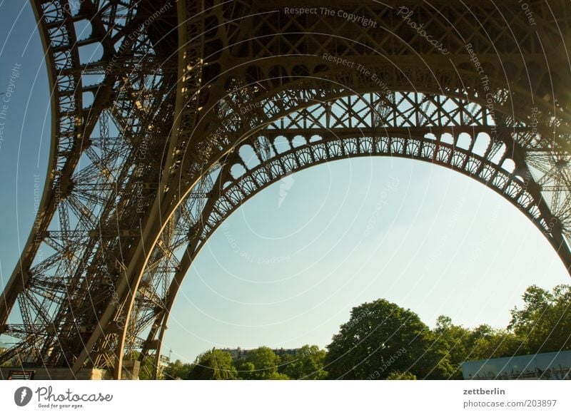 Eiffel Tower, Paris, France Summer Arch Archway Steel Iron Construction Engineer Structural engineering Rivet Riveted Foundations Prop Crossbeam Landmark