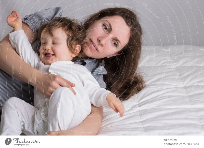 Baby girl playing with mother and have fun Lifestyle Joy Playing Child Toddler Woman Adults Parents Mother Family & Relations Smiling Love Embrace Happiness